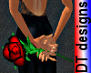Red black rose in hand